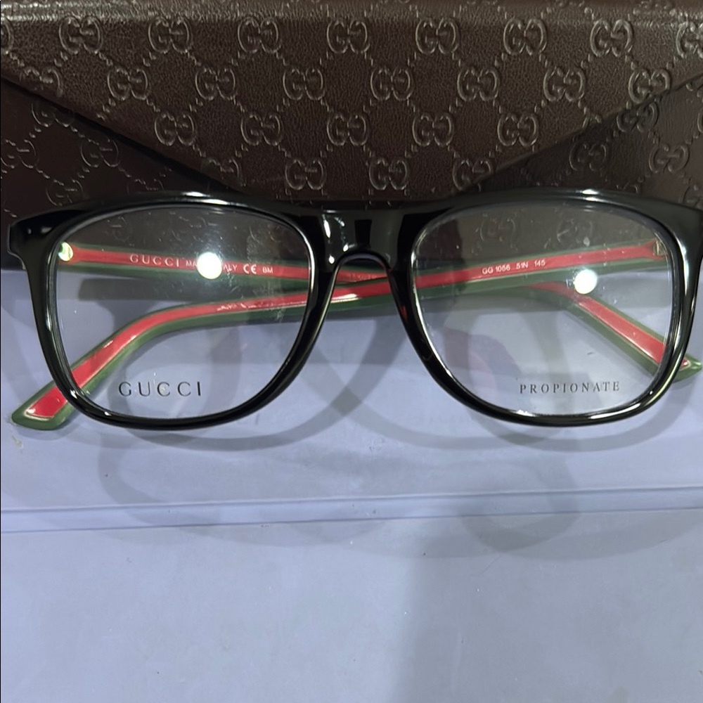 SOLD….Brand new authentic Gucci Black and Green Eyeglasses 1056 51N